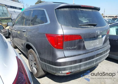 2018 Honda Pilot Touring z USA, uszkodzony, nr VIN 5FNYF5H98JB027001